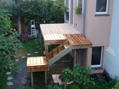 Terrasse sur pilotis en Teck, maison isolation par extérieur Terrasse sur pilotis en Teck, maison isolation par extérieur