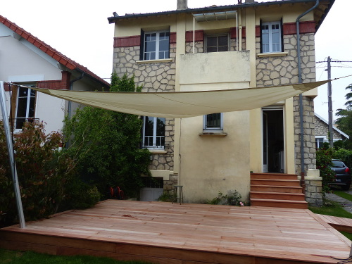 Voile d'ombre triangulaire pour ma terrasse