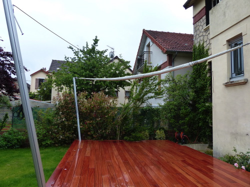 Voile d'ombre  enroulement automatique pour terrasse bois